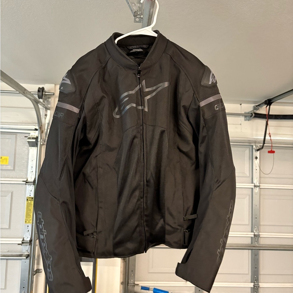 Alpinestars Black and Gray Performance Jacket for High-Speed Adventures